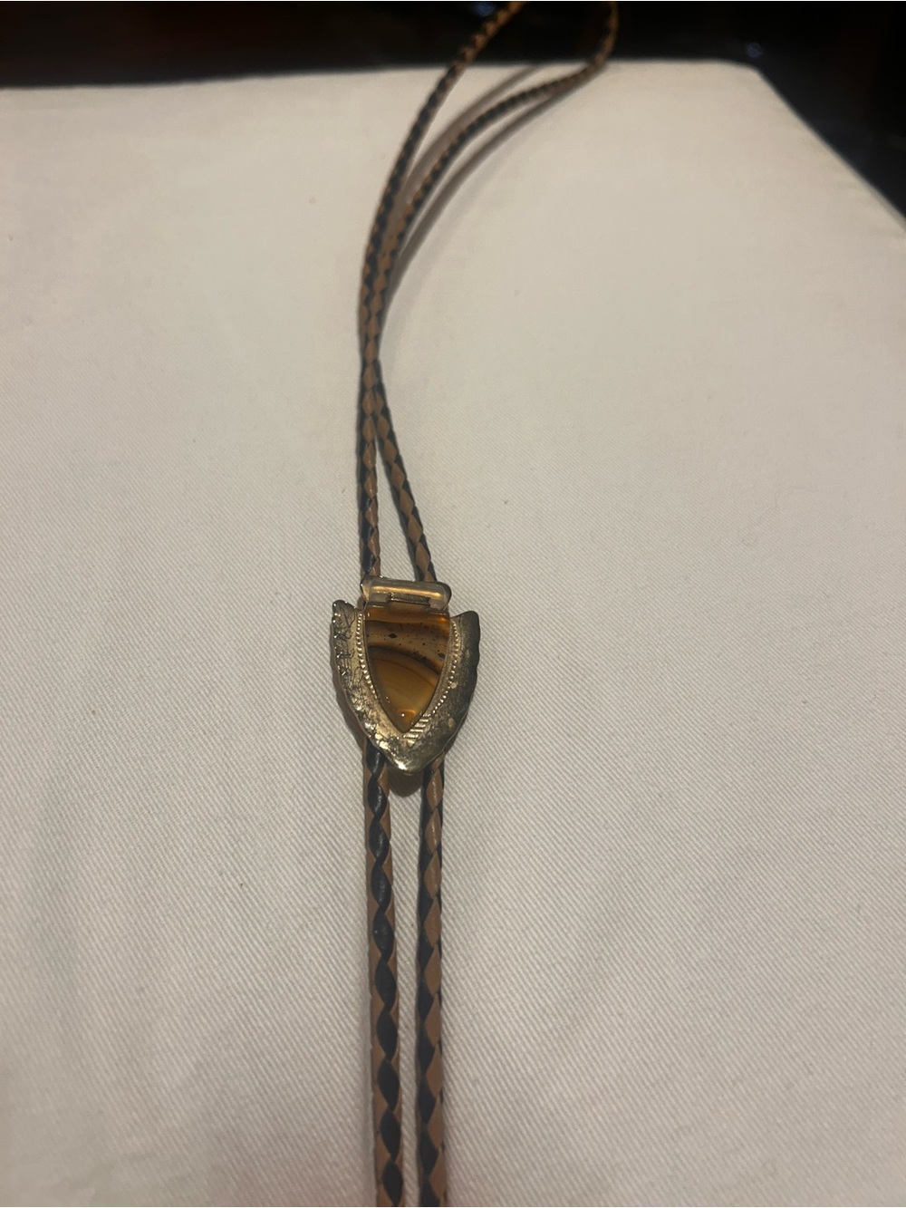 Brown Braided Leather Bolo Tie with Amber Shield Accent
